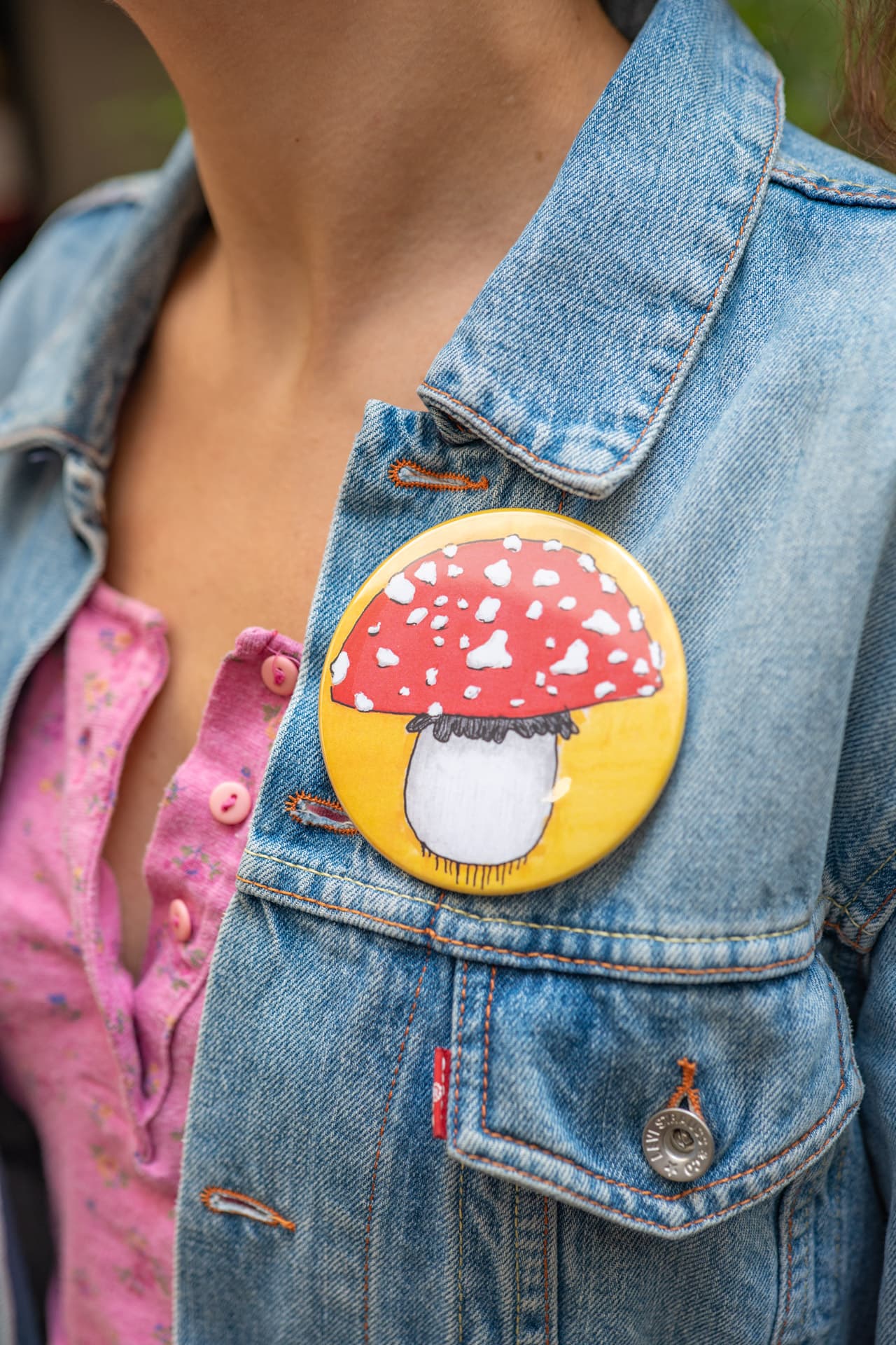 Detailed view of an 88mm custom button badge